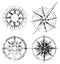 Four Grunge Compasses