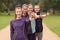 Four Healthy Women in Line Showing Thumbs Up