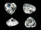 Four heart shape gems isolated on a black