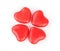 Four heart shaped candies