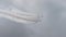 Four jets in cloudy sky