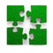 Four jigsaw puzzles with green grass, 3D illustration