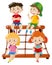 Four kids on rope climbing station