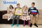 Four kids show inscription learn slovenian. Foreign language learning concept. Slovenski
