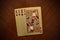Four king playing cards on wooden background, four playing cards of the same suit, playing cards one on one from above the king of