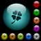 Four leaf clover icons in color illuminated glass buttons