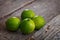 Four limes on table