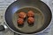 Four Meatballs in a Frying pan