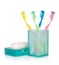 Four multicolored toothbrushes and soap