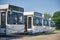 Four new buses standing in the line