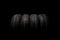 Four new tires isolated on black background