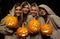 Four nuns holding halloween pumpkins