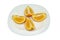 Four orange fruit segments isolated on white plate. Clipping Path
