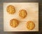 Four Pandan Mooncake on wooden background. Aerial view.