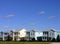 Four pastel houses in a row