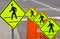 Four pedestrian traffic warning signs