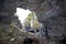 Four People Caving In Lava Tube Cave