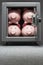 Four piggy banks in safe