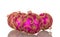 Four pink bright balls decorated with golden scroll