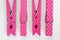 Four Pink Clothes Pins with Fun Patterns Two Flipped Top View