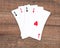 Four poker playing cards