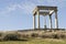 Four posts monument and its cross.