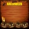 Four pumpkins on wood background Halloween concept