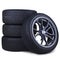 Four racing tires isolated