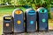 Four recycling bins in town park