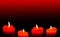 Four red burning candles with ornament decorations.