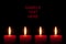 Four red candles, black background