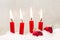 Four red candles for christmas - classic red and white