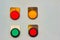 Four red yellow green lights on a steel board panel signal