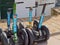 Four segways on the street