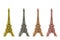 Four shiny figurines of the Eiffel tower in different colors.isolate