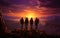 Four silhouettes of group of adventurers stand on top of mountain and watch the sunset