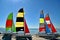 Four Small Catamarans with Brightly Colored Sails on a Key Biscayne Beach