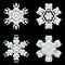 Four snowflakes winter decorations collection on black