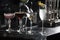 Four special cocktails on a bar desk. black background