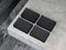 Four stacks black textured Business Cards Mockup on concrete background