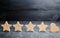 Four stars and heart on a black background. rating five stars, the choice of the editorial office and the buyer. concept of rating