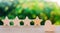 Four stars and heart on a green bokeh background. rating five stars, the choice of the editorial office and the buyer. concept of