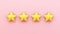 four stars on pink background