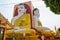 Four statues of sitting Buddhas. Pagoda Kyaikpun Buddha. Bago, Myanmar. Burma.