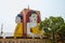 Four statues of sitting Buddhas. Pagoda Kyaikpun Buddha. Bago, Myanmar. Burma.