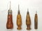 FOUR STITCHING AWLS