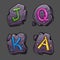 Four stones with colored crystals in the form of letters J Q K A