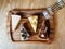 Four tarts on a wooden serving tray