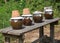 Four Terracotta jar for fermenting with fish sauce on wooden table