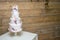 Four tier wedding cake with icing flowers